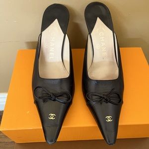 CHANEL leather mules